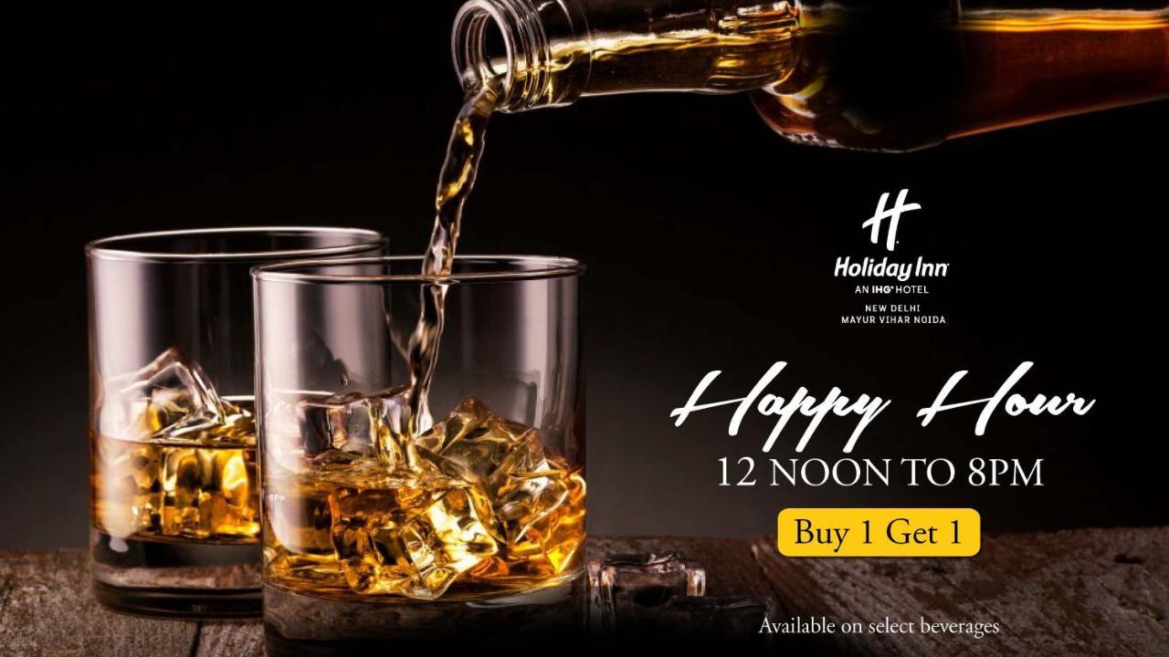 Holiday Inn New Delhi Mayur Vihar Noida By Ihg Exterior foto A poster advertising a happy hour